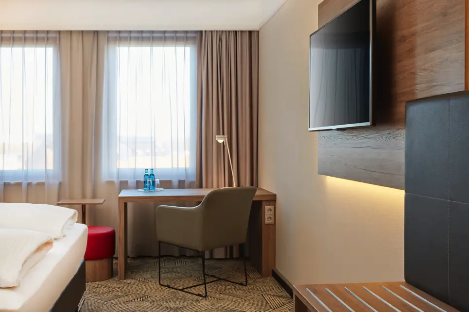 Comfort twin room at the H4 Hotel Hannover Messe - Official website