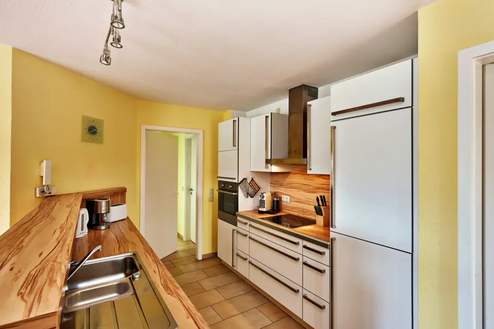 Kitchen area in one of the apartments at the H+ Hotel Ferienpark Usedom - Official website