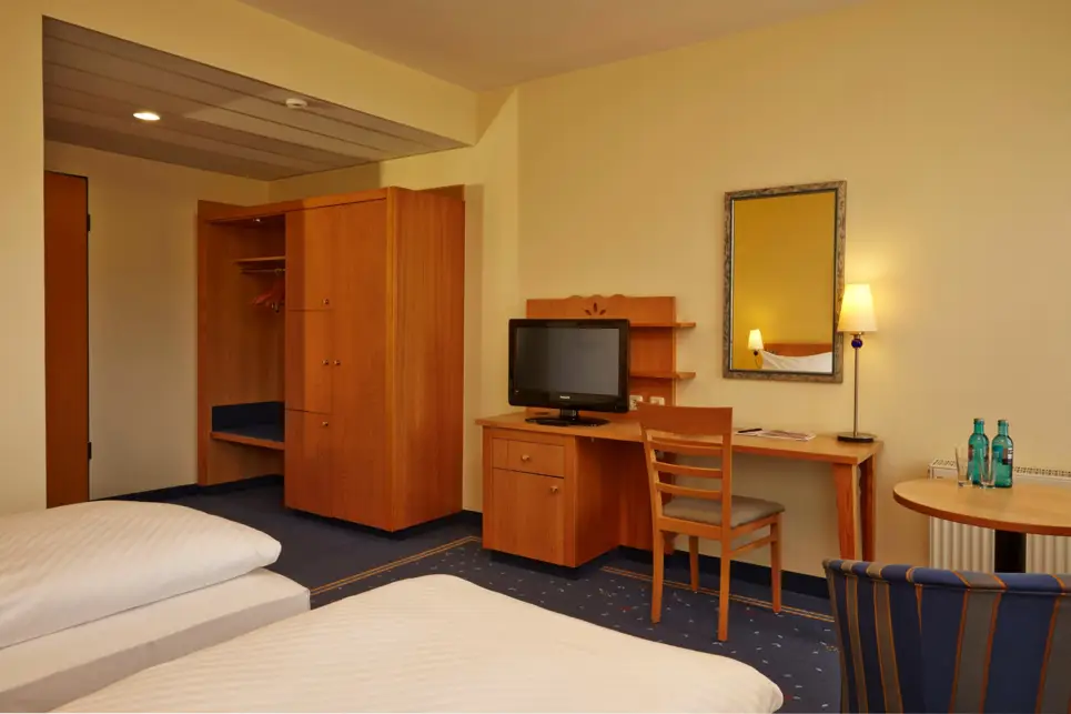 A comfortable hotel room at the H+ Hotel & Spa Friedrichroda - Official website