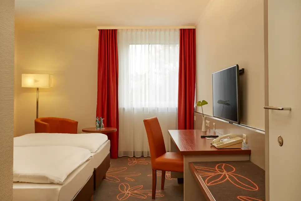 Spacious Comfort room at the H+ Hotel Leipzig - Official website