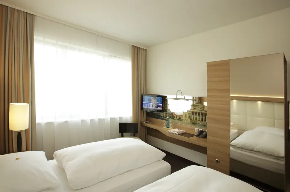 Modern comfort twin room at the H4 Hotel Berlin Alexanderplatz - Official website