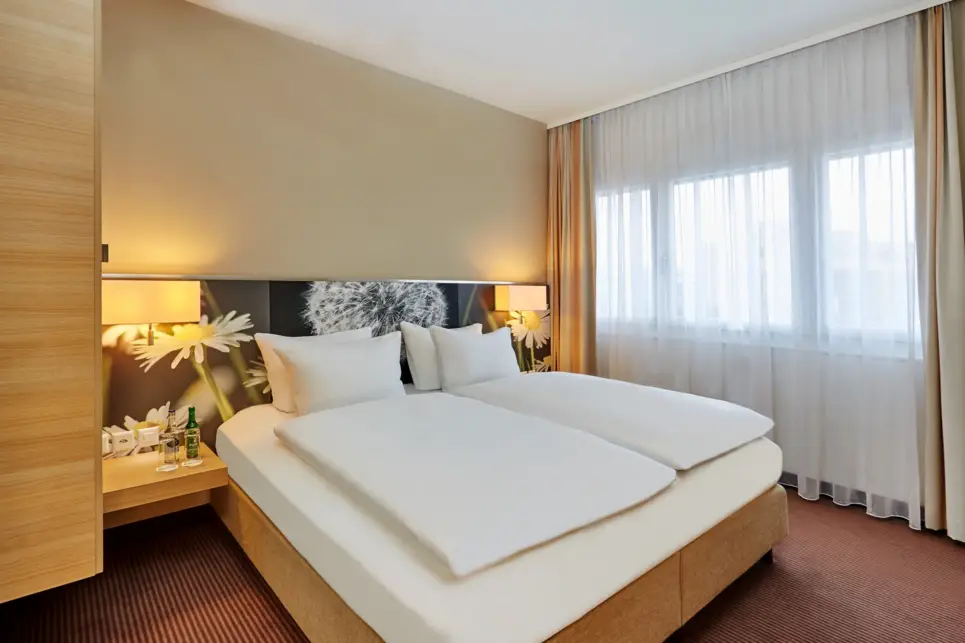 Moderne Junior Suite im H+ Hotel Zürich - Offizielle Webseite