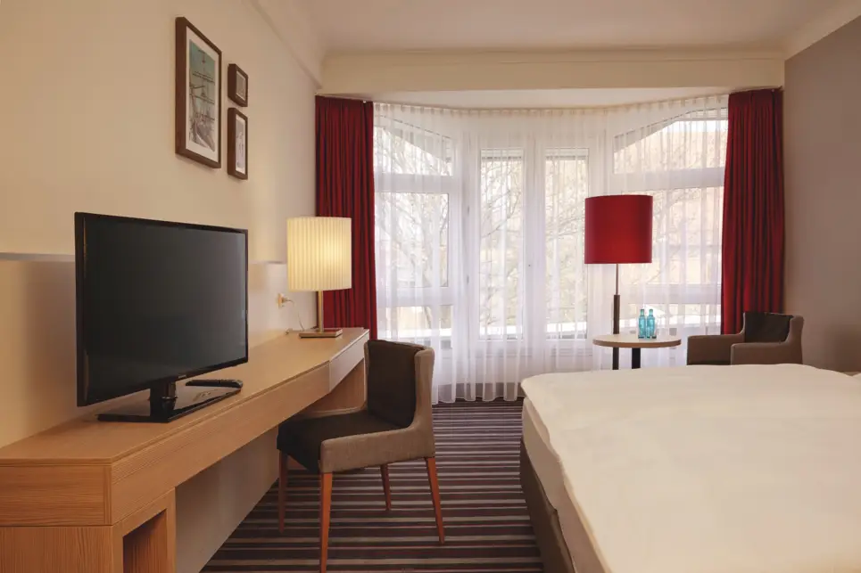 A spacious hotelroom at the H+ Hotel Stade Herzog Widukind - Official website