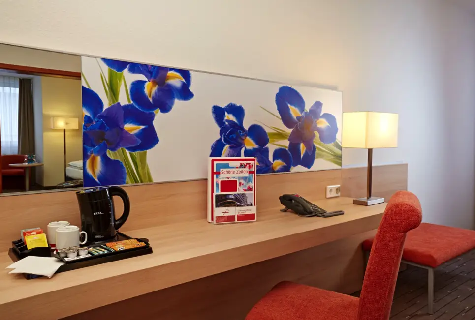 Suite amplia del Hotel H+ Hotel Wiesbaden Niedernhausen - sitio web oficial