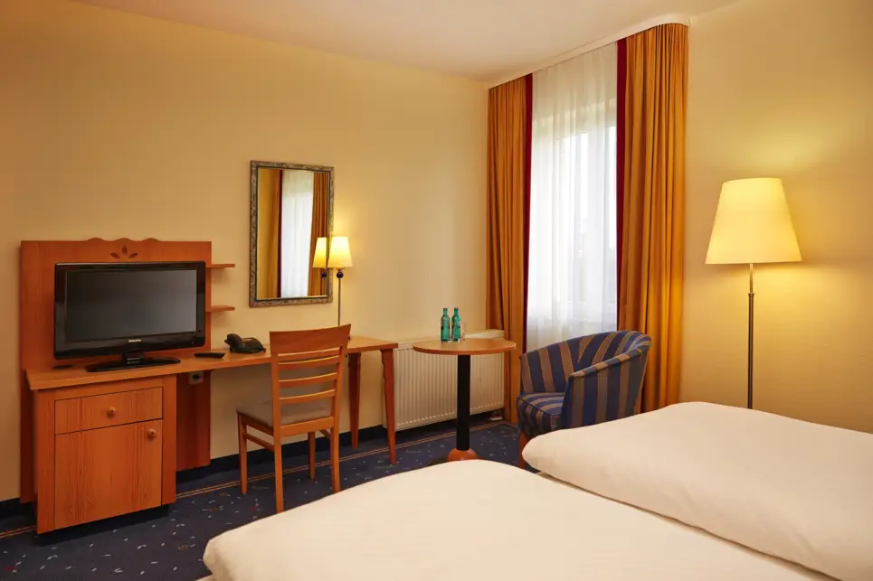 A comfortable hotel room at the H+ Hotel & Spa Friedrichroda - Official website