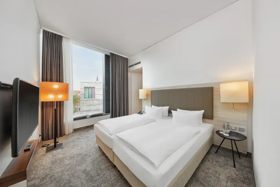 Spacious junior suite at the H4 Hotel Münster - Official website